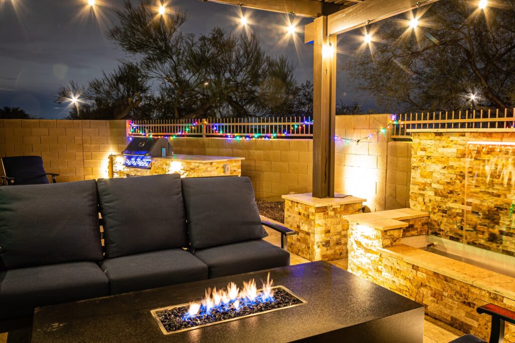 backyard living space and fireplace design katy texas